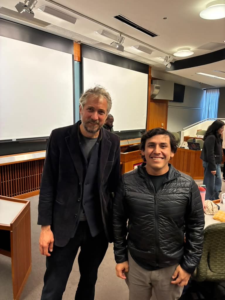 Ben Whately with Martín Sosa in a lecture room
